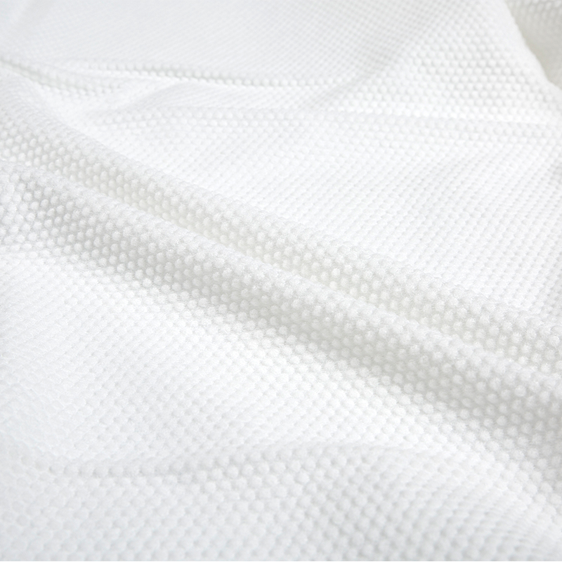 Large pearl semi-cross spunlace nonwoven